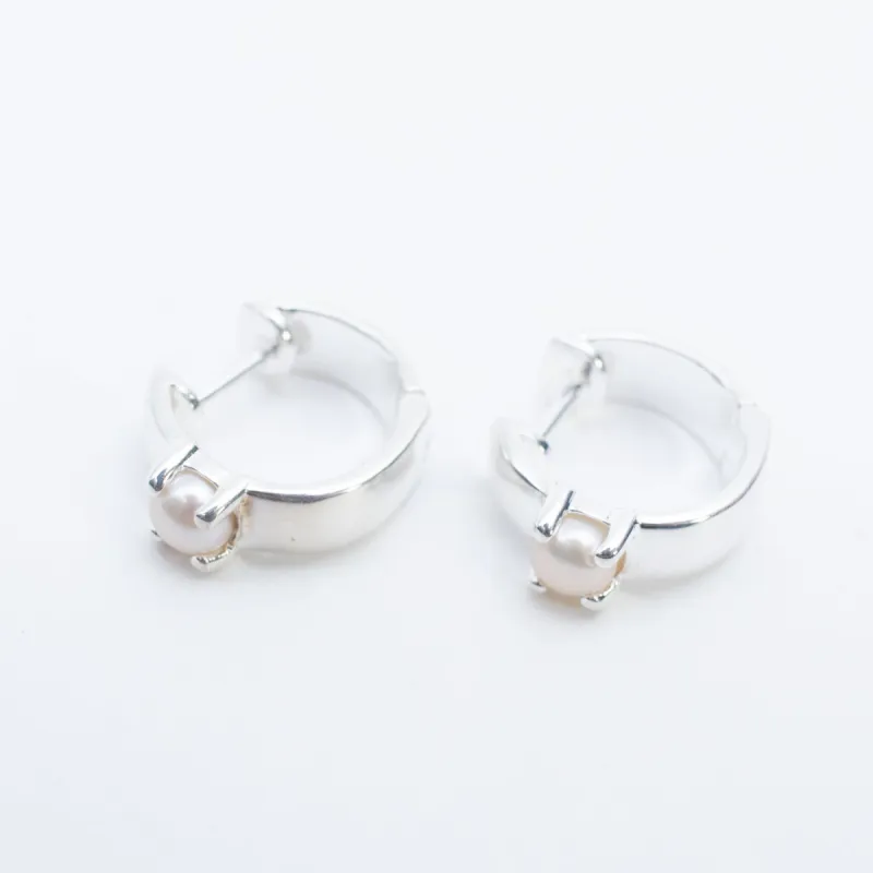Silver Claw Set Pearl Hoops sold by Silver Lotus