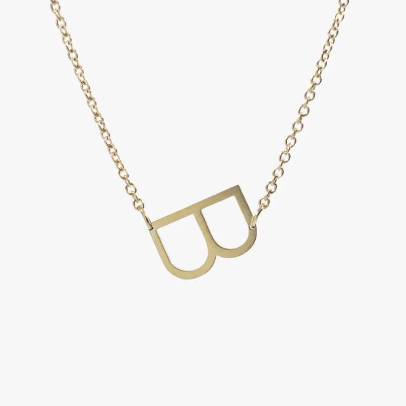 Asymmetrical Gold Initial Necklace sold by Silver Lotus