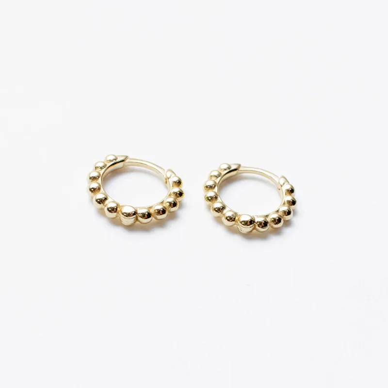 Beaded Huggie Hoops sold by Silver Lotus