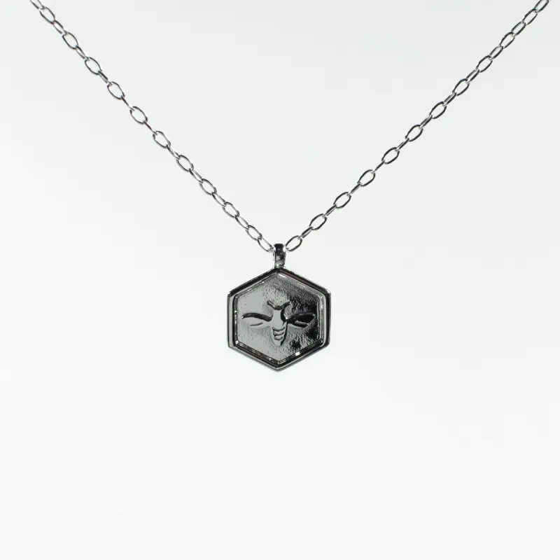 Silver Hexagon Shaped Honeybee Necklace sold by Silver Lotus