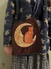 Mini Moon/Cat/Sun(9) sold by Sapphic Oracle