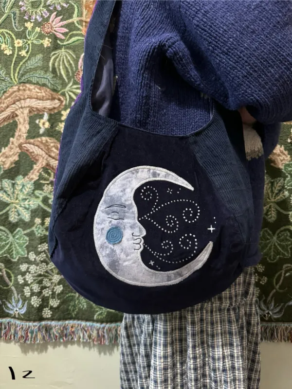 Classic Navy Moon/Moth(12) sold by Sapphic Oracle
