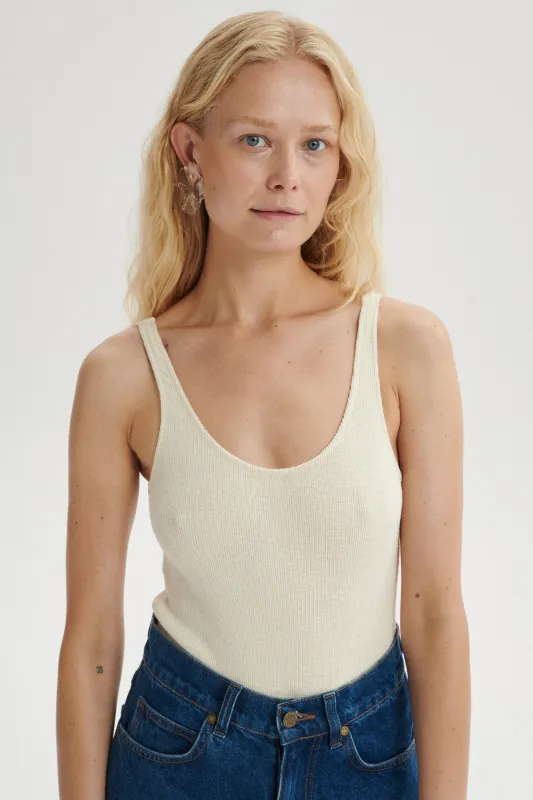 Joy Bodysuit - cream sold by Le Petit Trou