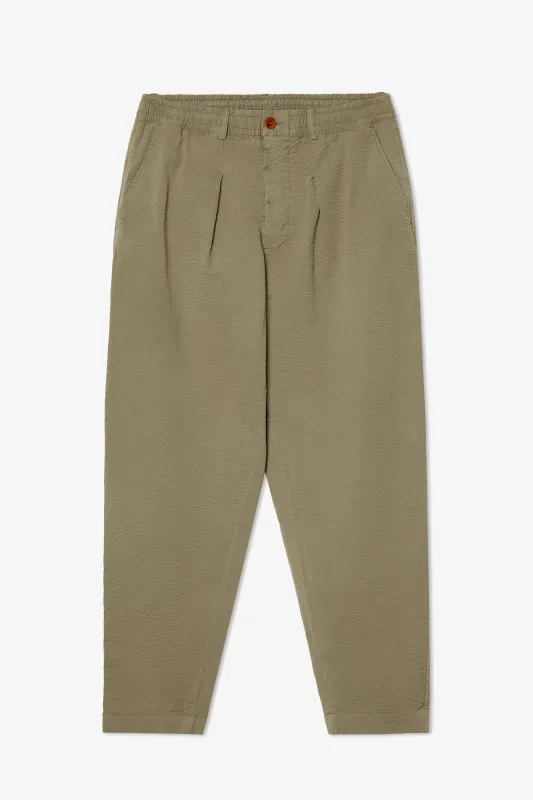 LOOSE KHAKI SEERSUCKER TROUSER sold by Pompeii