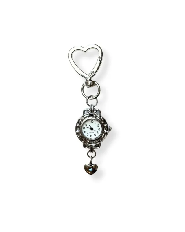 Silver Bag Charm with Blue Gem Heart sold by Sage & Saber