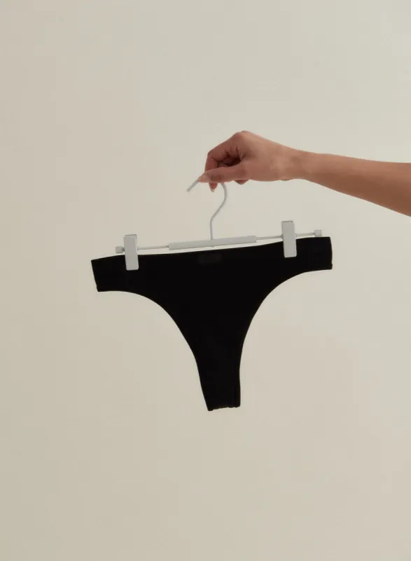 Black Seamless Thong sold by Aimn