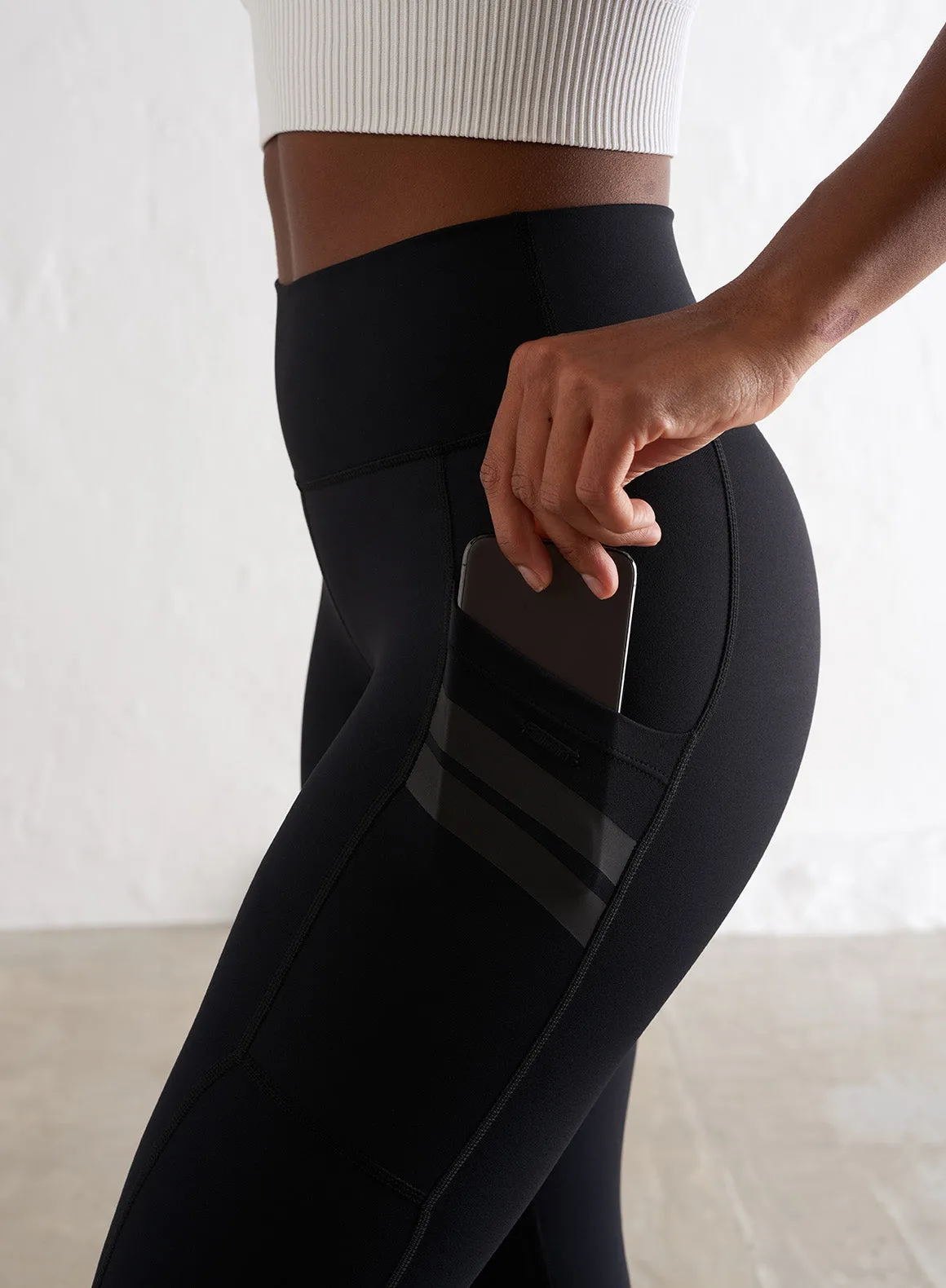 Black Essential Tights sold by Aimn