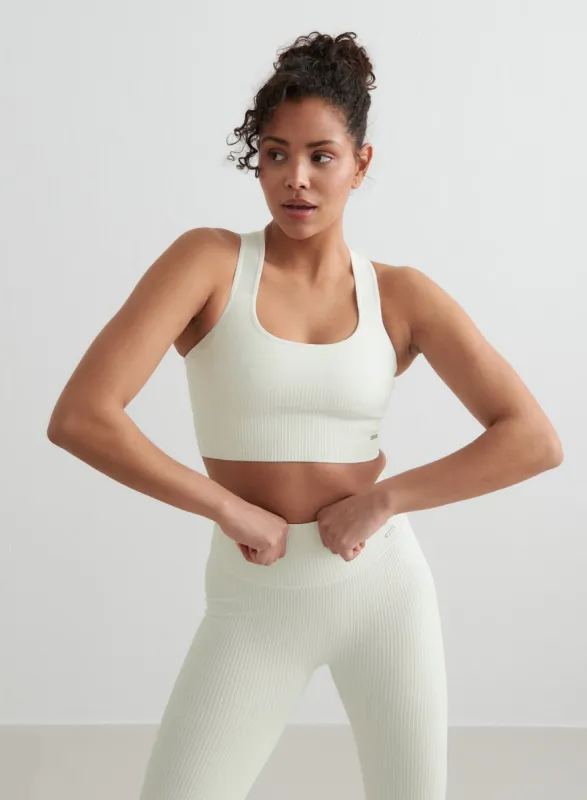 Off-White Ribbed Seamless High Support Bra sold by Aimn