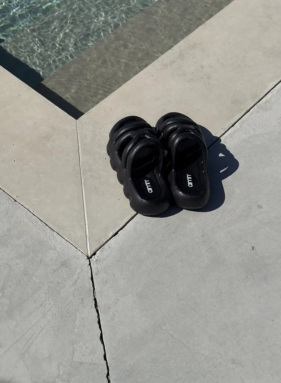 Black Strappy Slide sold by Aimn