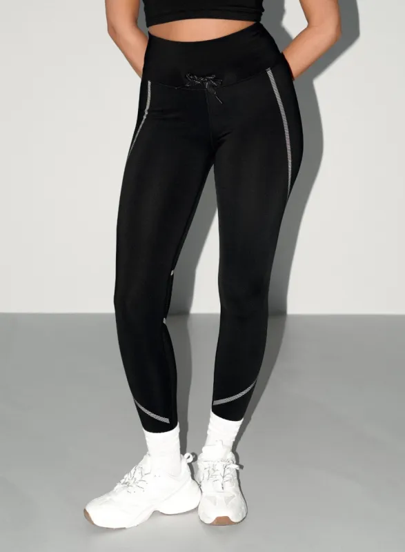 Black Reflective Warming Tights sold by Aimn