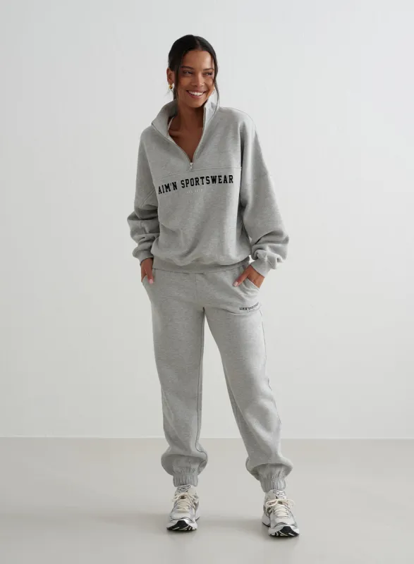 Grey Melange Varsity Sweat set sold by Aimn