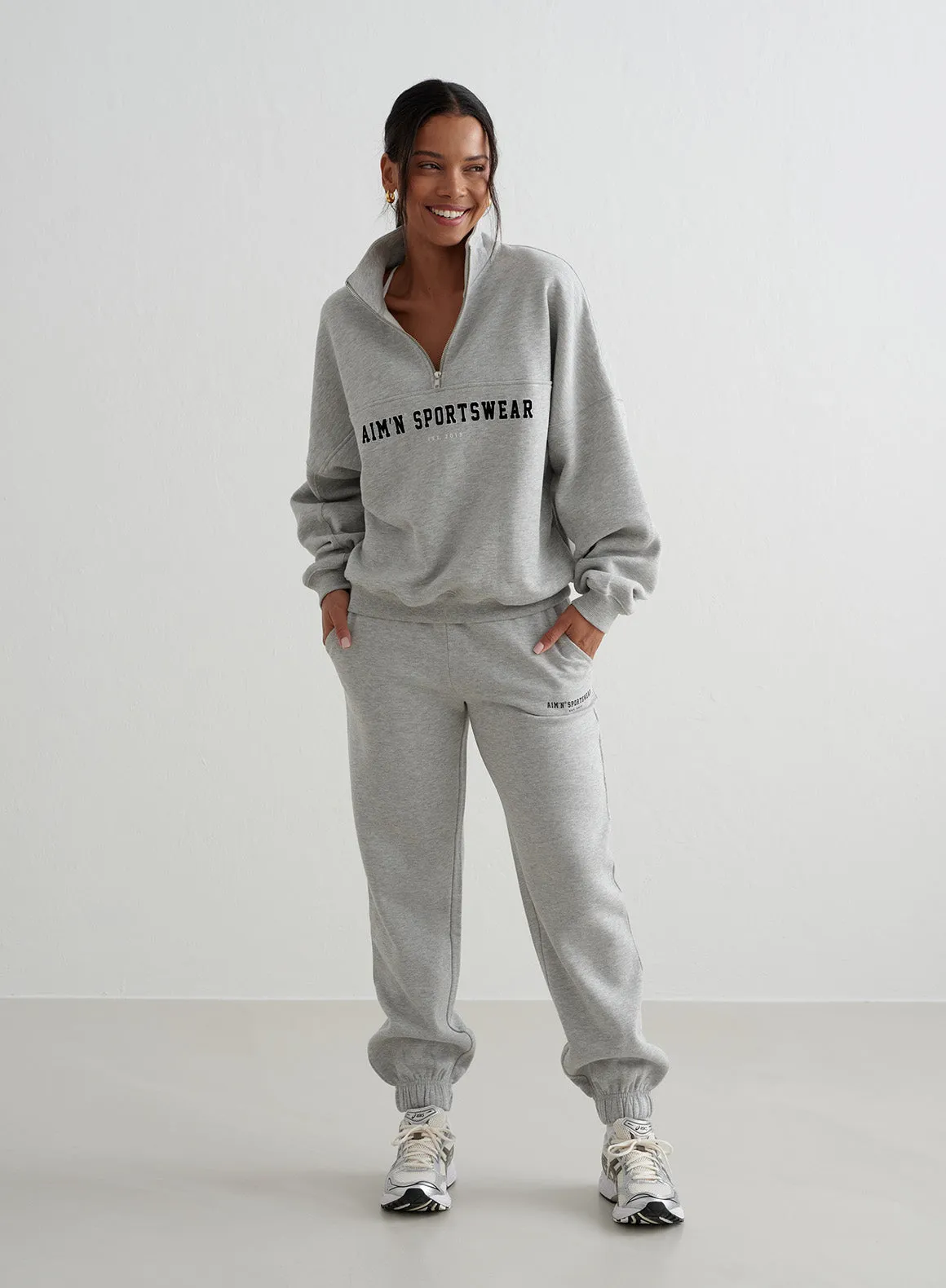 Grey Melange Varsity Sweat set sold by Aimn