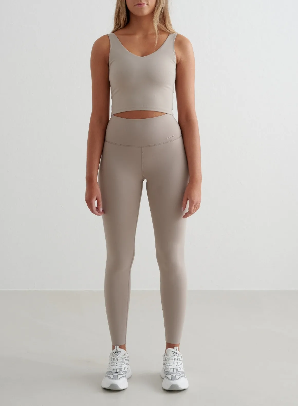 Dark Clay Sense Tights sold by Aimn