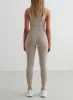 Dark Clay Sense Tights sold by Aimn