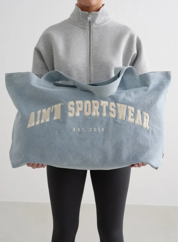 Denim Varsity Tote Bag sold by Aimn