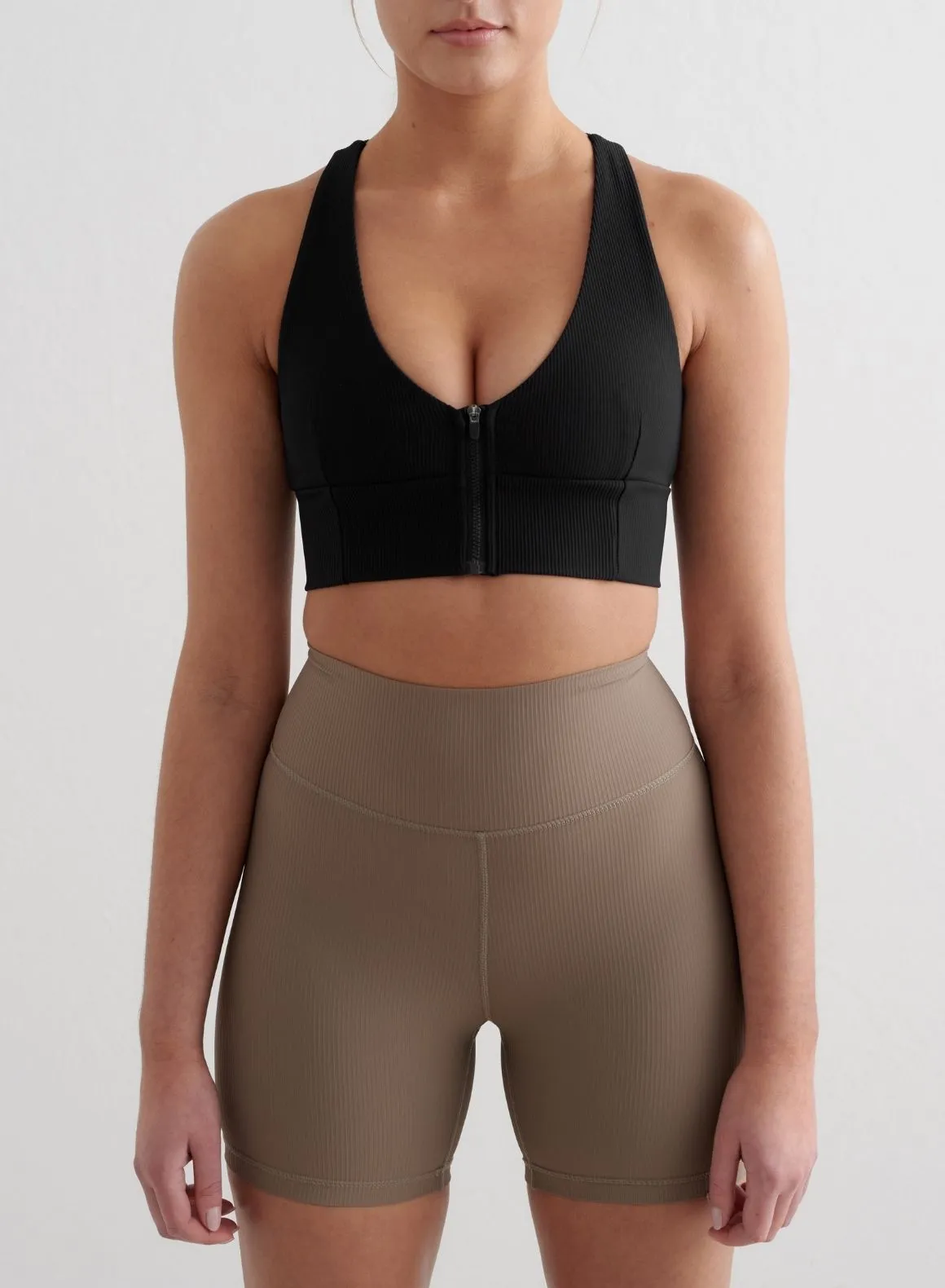 Black Ribbed Performance Zipped Bra sold by Aimn