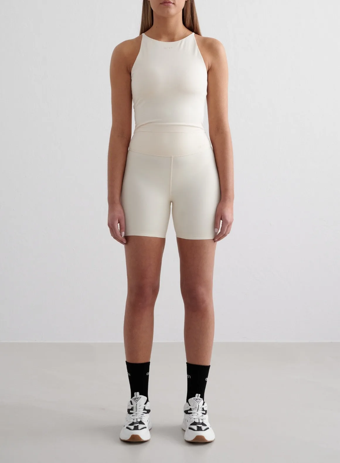 Almond White Sense Midi Biker Shorts sold by Aimn