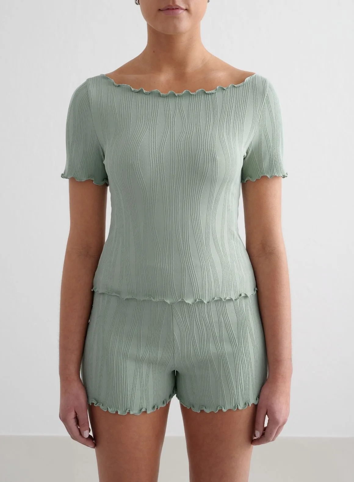 Aqua Tulip Short Sleeve Top sold by Aimn