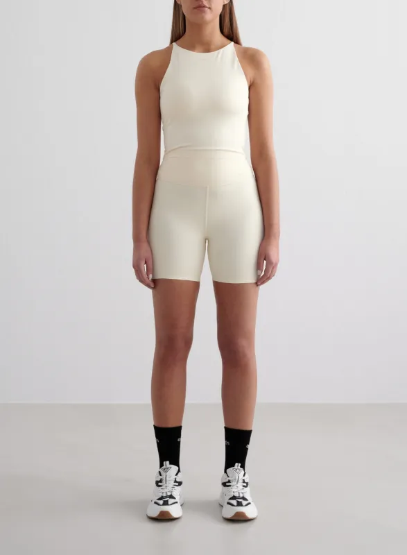 Almond White Sense Midi Biker Shorts & Halter Bralette Set sold by Aimn