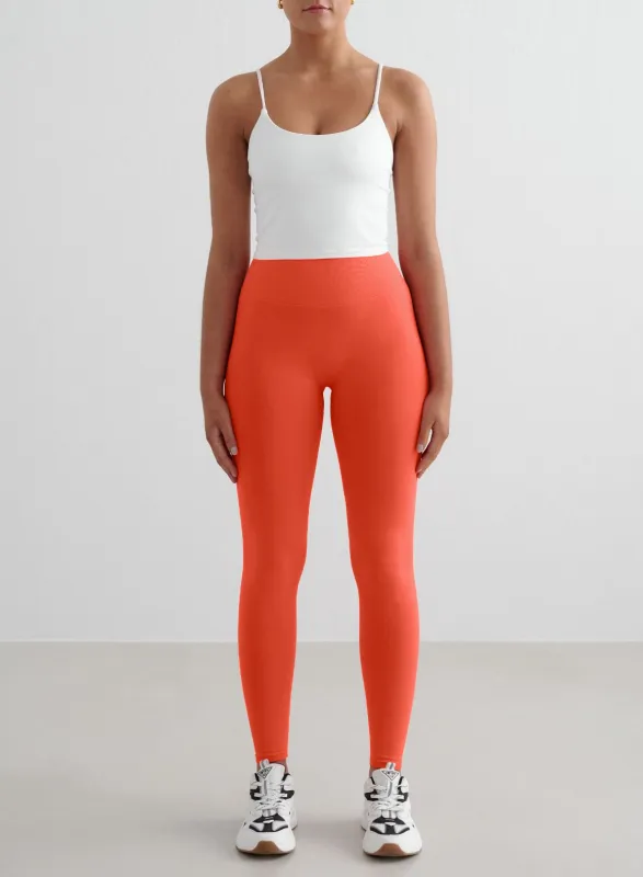 Tangerine Shape Seamless Tights & White Strap Singlet Set sold by Aimn