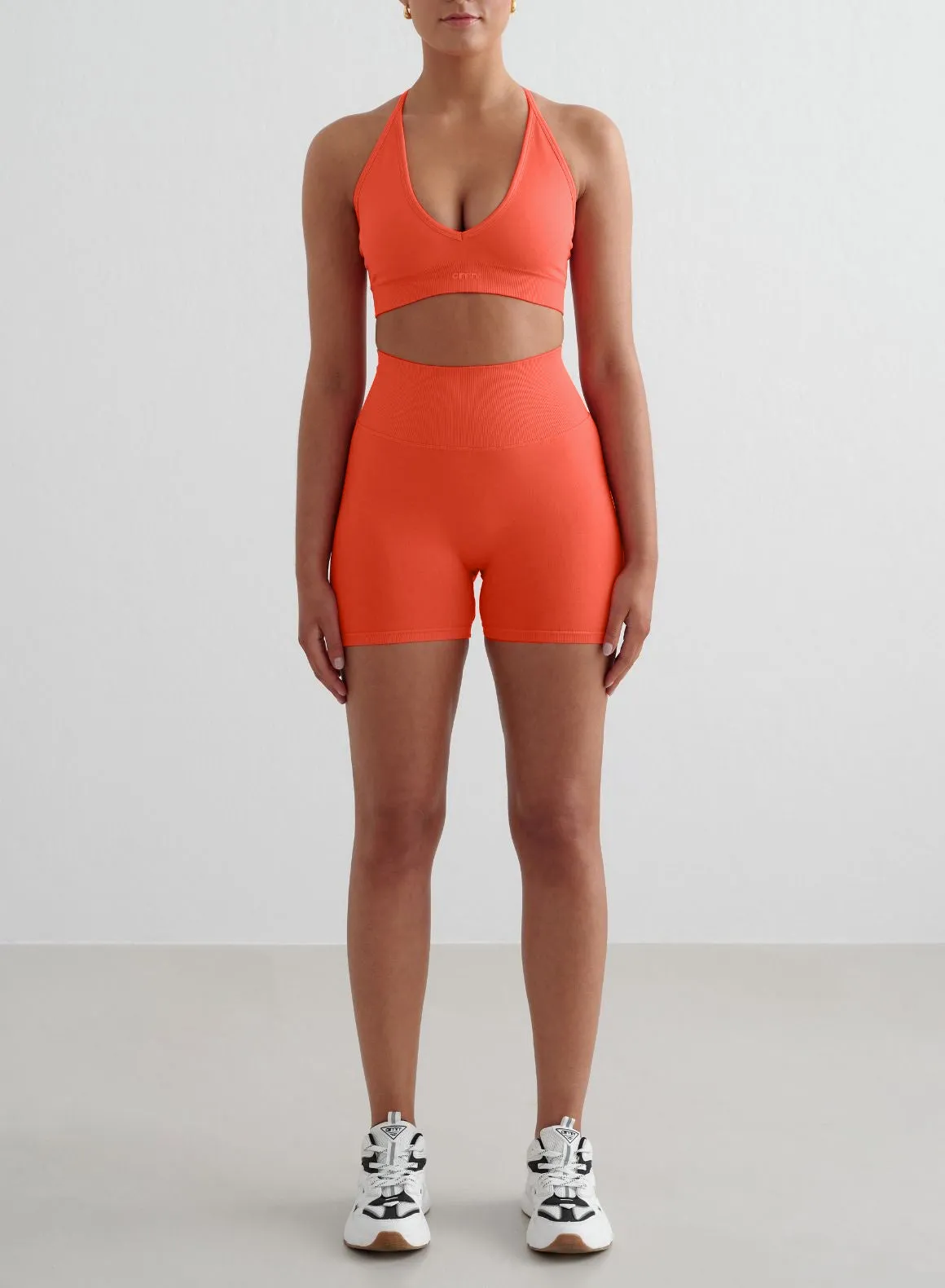 Tangerine Shape Seamless Hotpants & Cross Back Bra Set sold by Aimn