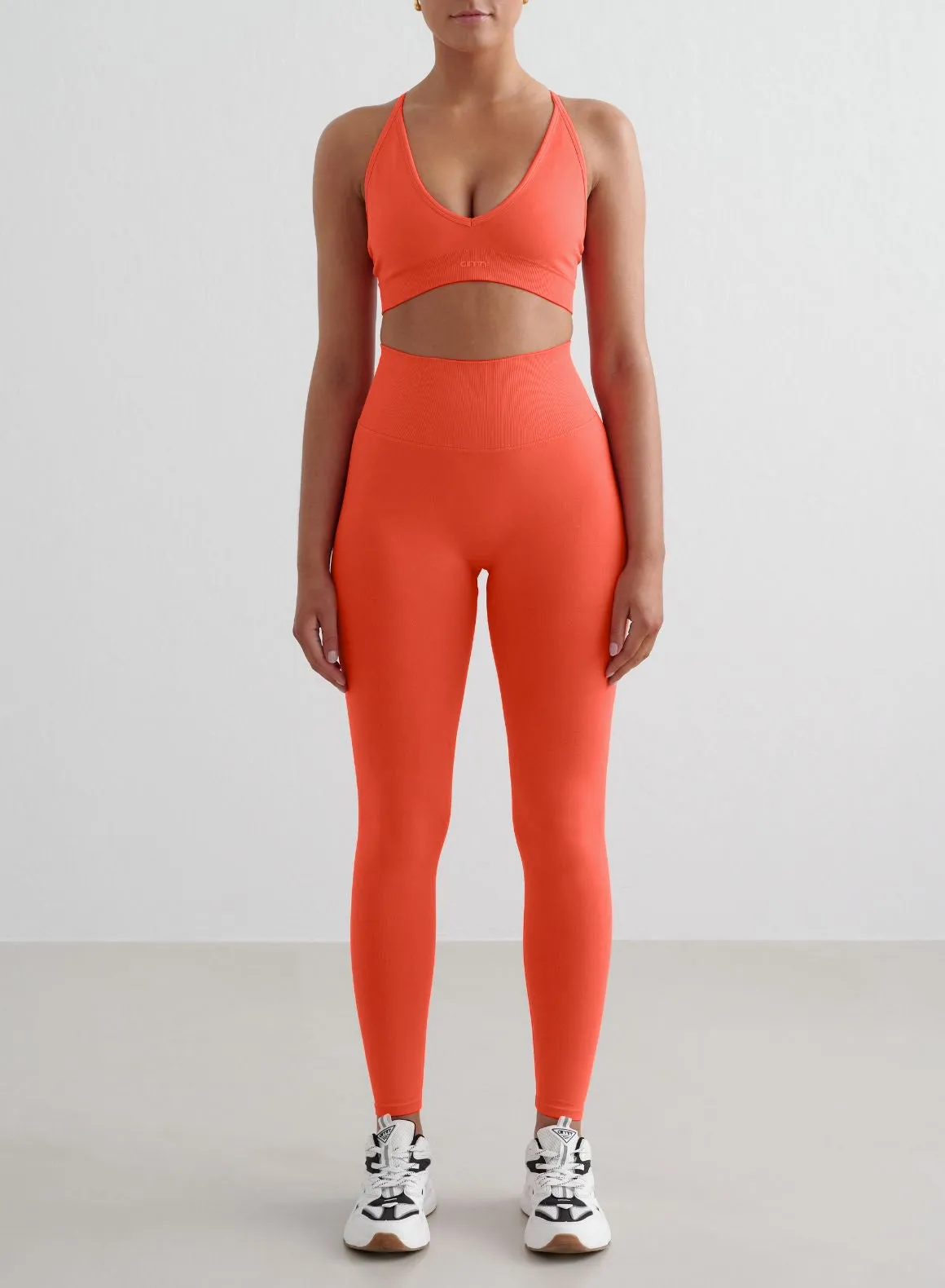 Tangerine Shape Seamless Tights & Cross Back Bra Set sold by Aimn