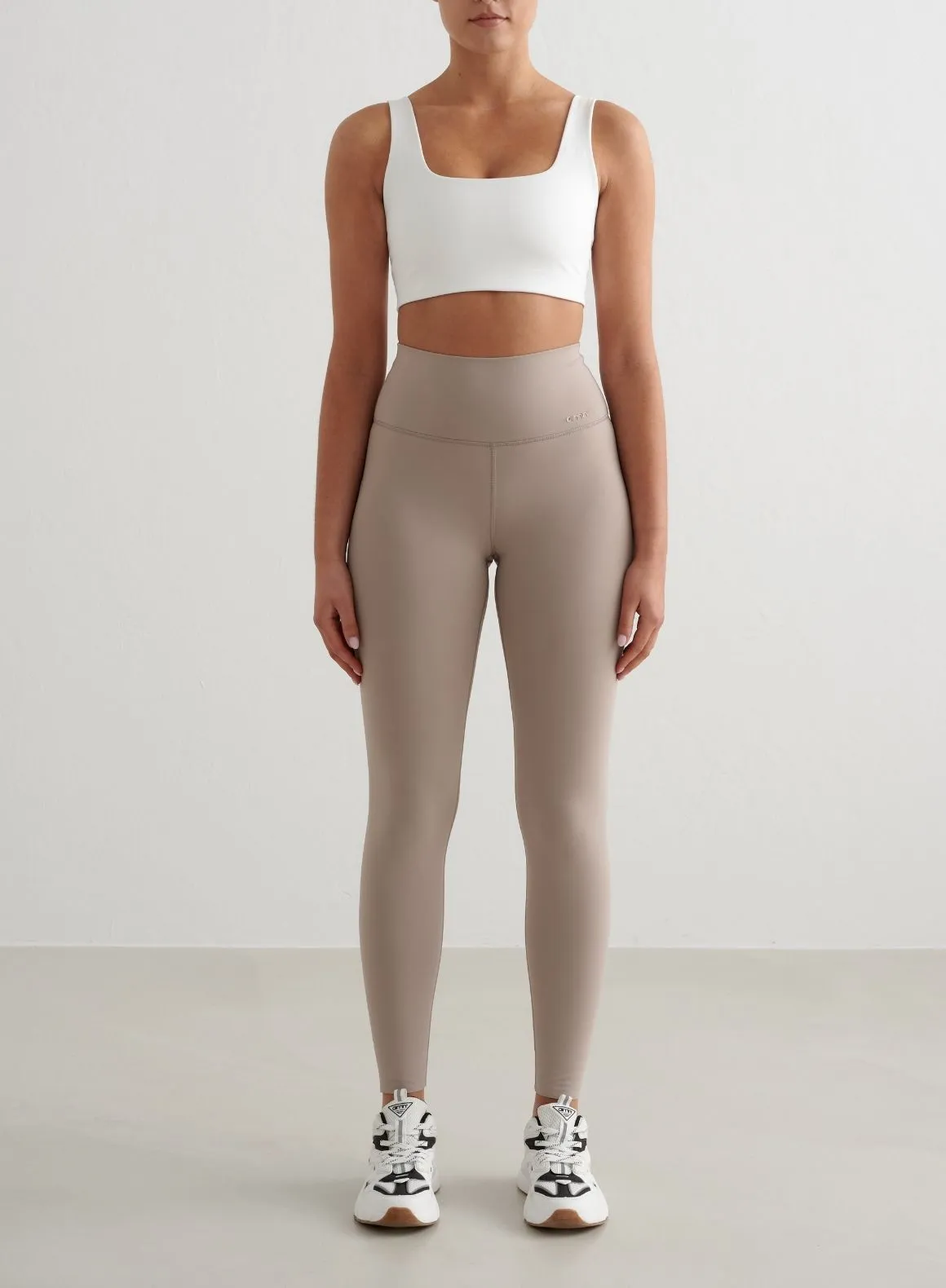 Dark Clay Sense Tights & White Bra Set sold by Aimn