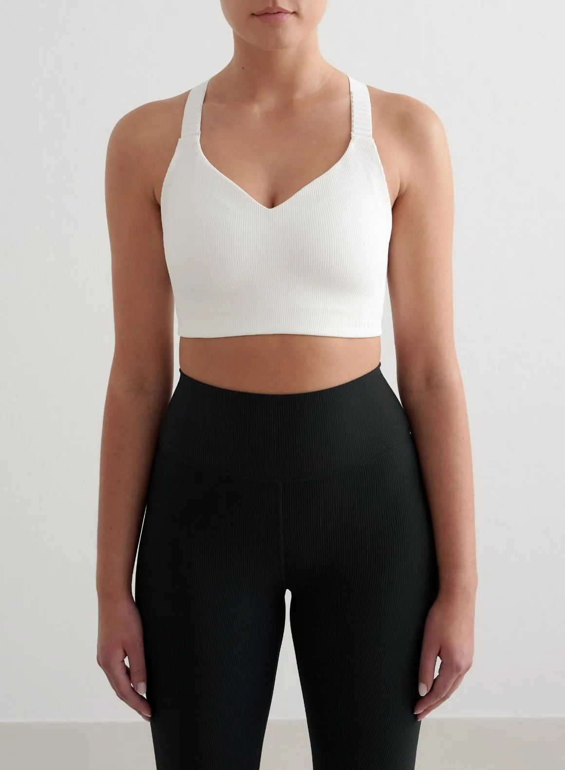White Ribbed Performance Support Bra sold by Aimn