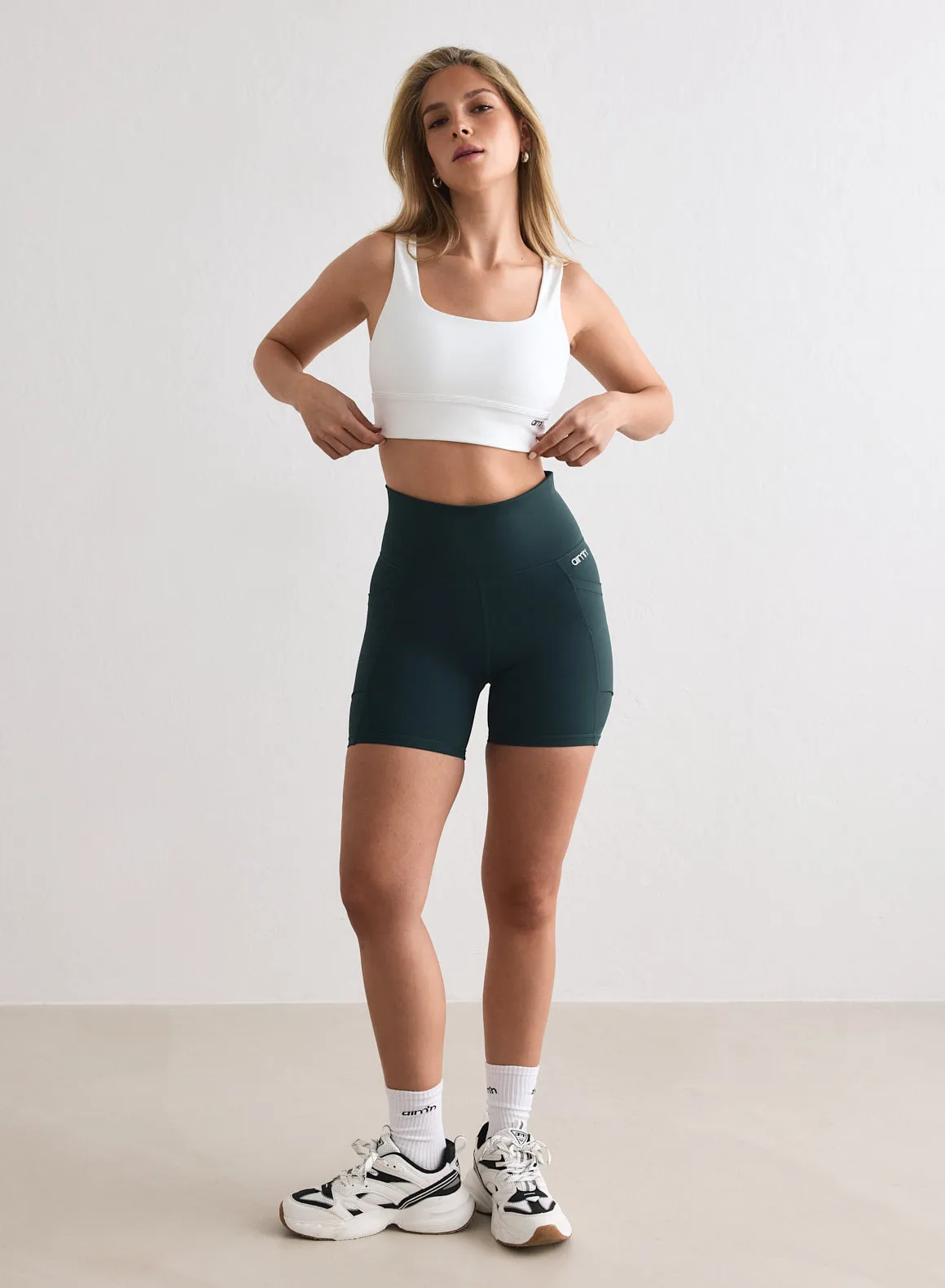 Deep Emerald Double Pocket Midi Biker Shorts sold by Aimn