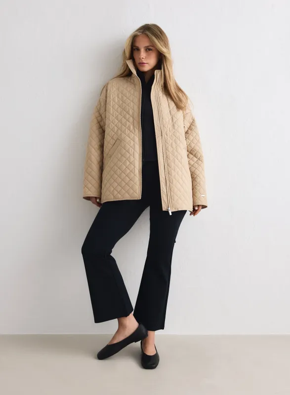 Beige Oversized Quilted Jacket sold by Aimn
