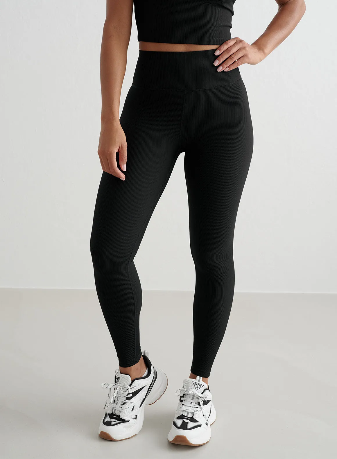 Black Ribbed Performance Tights sold by Aimn