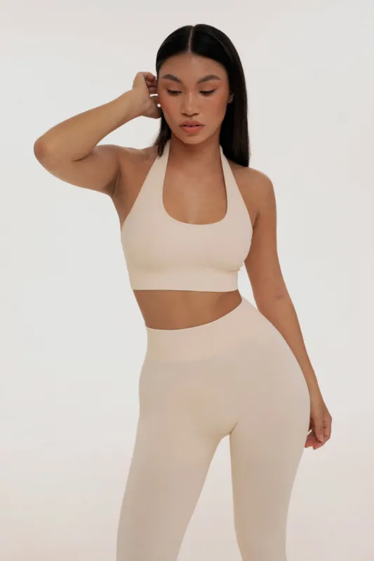 Ivory halter neck top sold by Foxy Activewear