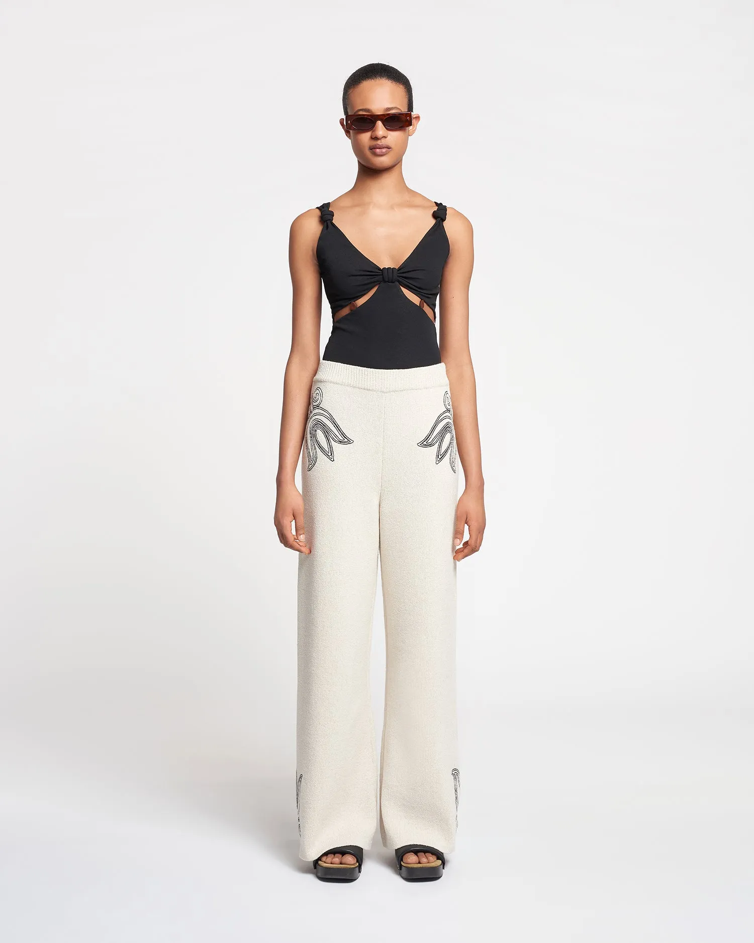 Emmie - Embroidered Textured-Linen Pants - Natural/Black sold by Nanushka