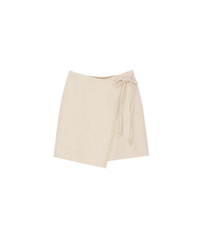 Delaney - Mini Wrap Skirt - Creme sold by Nanushka