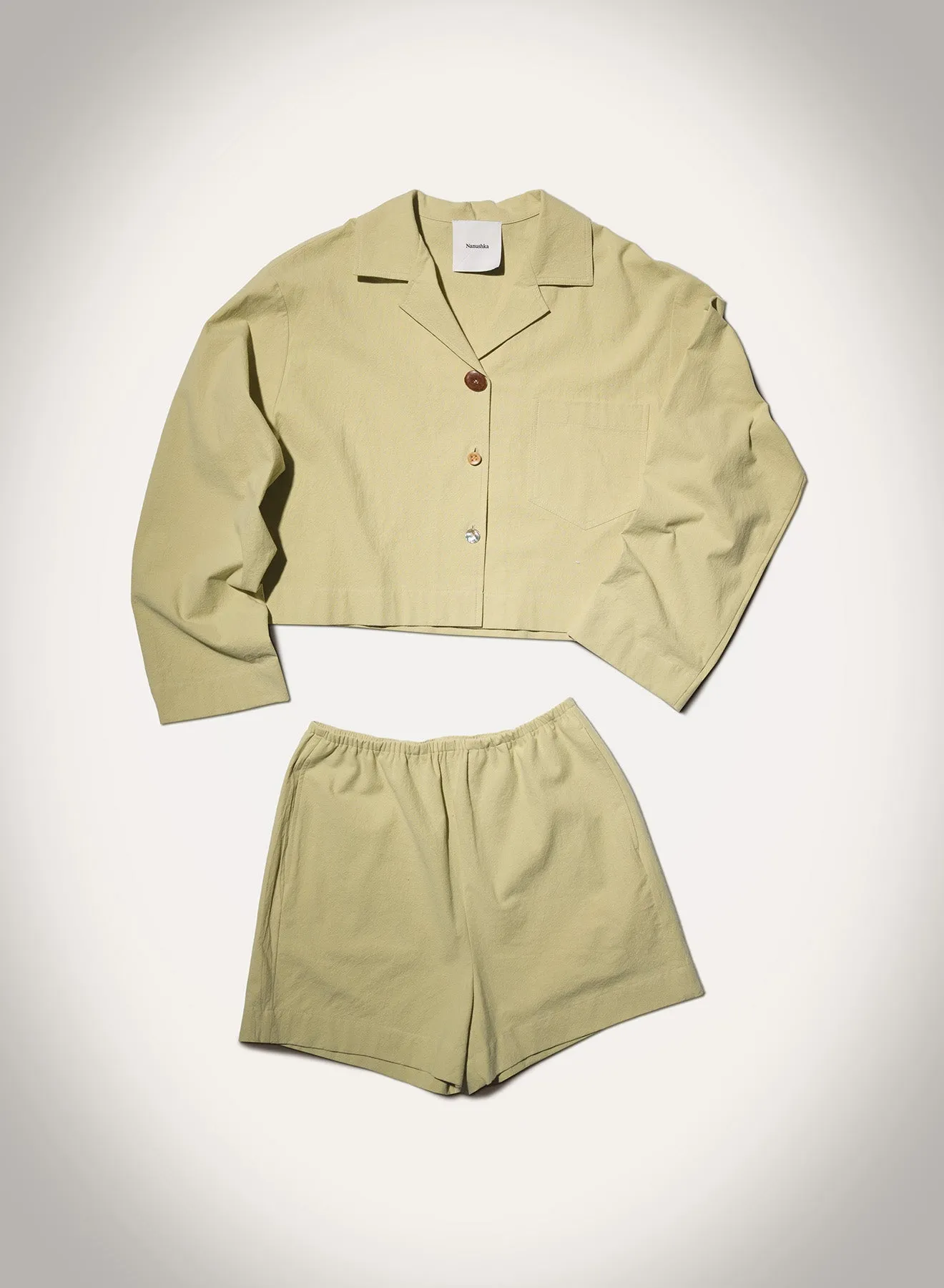 Dylla - Tailored Washed Calico Shorts - Sage sold by Nanushka