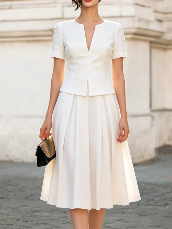 Split-Neck Short-Sleeve Peplum Top & Pleated A-Line Midi Skirt Two-Piece Set made by Something Navy