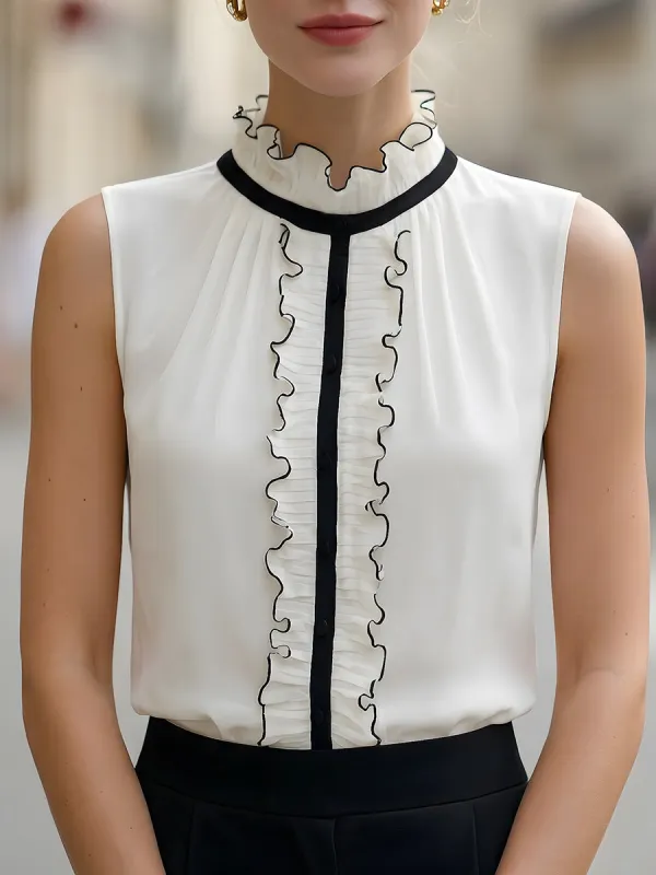 Sleeveless Ruffled Blouse With Black Contrast Trim made by Mooyius