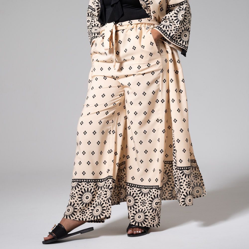 Border Print Soft Poly Pants sold by Fashion World