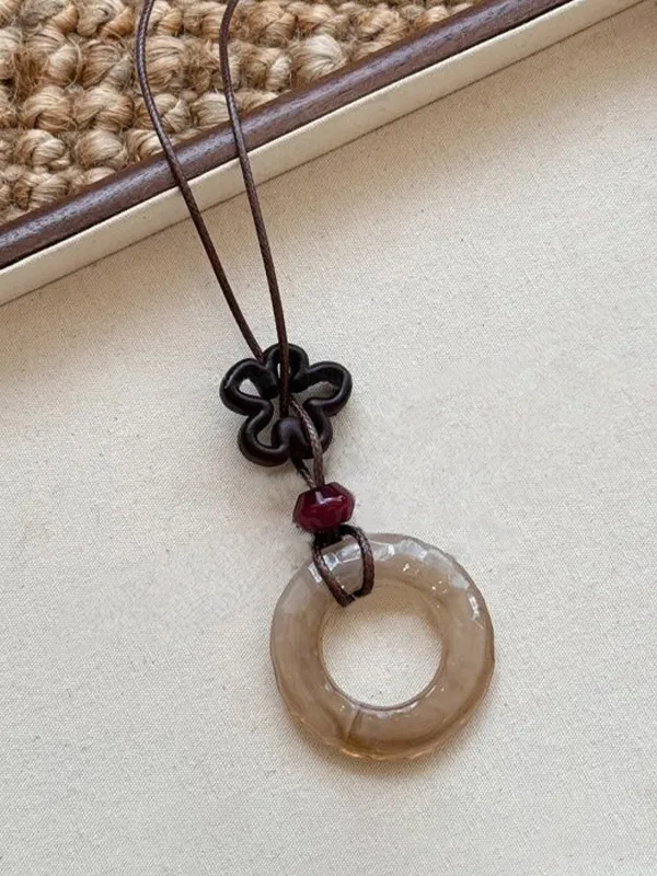 Long Pendant Necklace With Marbled Design sold by Lintico