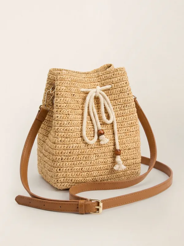 Mini Handwoven Raffia Drawstring Crossbody Bag made by Lintico