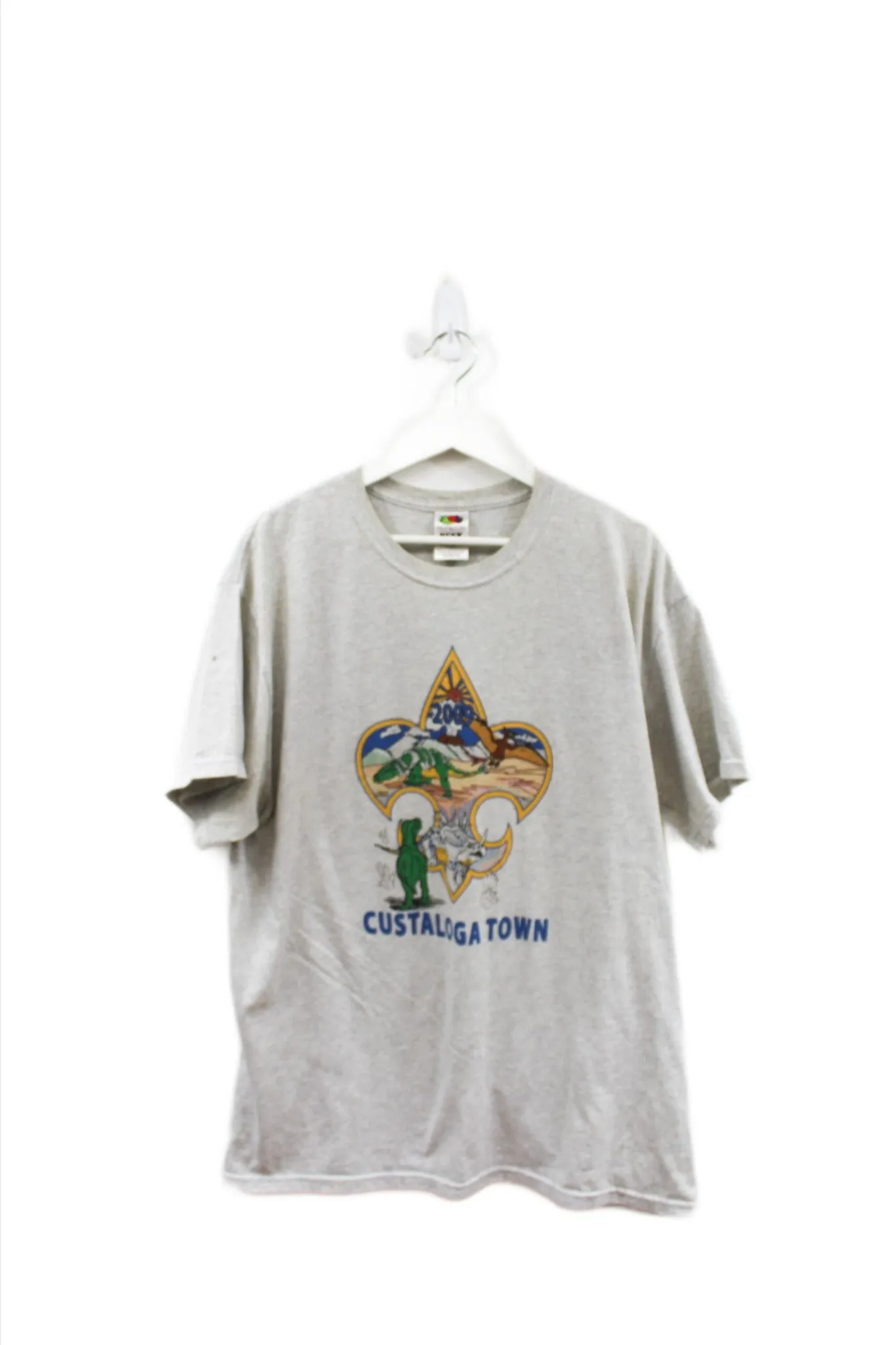 X - 2009 Custaloga Town Dinosaur Tee sold by HG Vintage