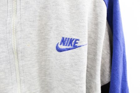 CC- Vintage 90s Nike Track Jacket sold by HG Vintage
