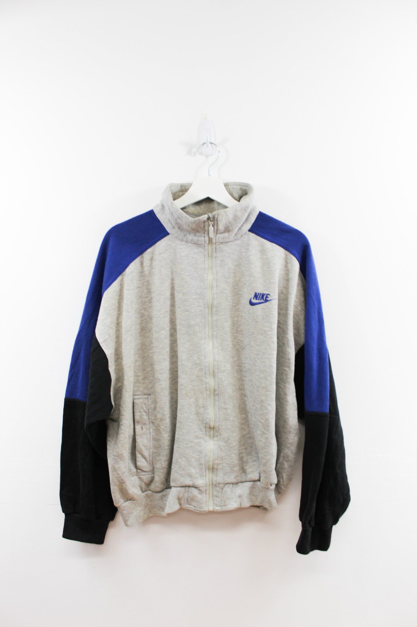 CC- Vintage 90s Nike Track Jacket sold by HG Vintage