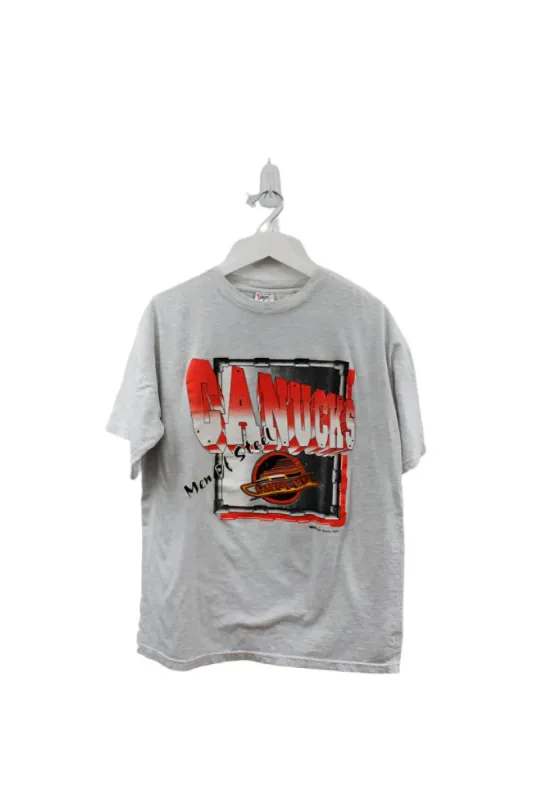 Z- Vintage 1993 Canucks Men Of Steel NHL Graphic Tee sold by HG Vintage