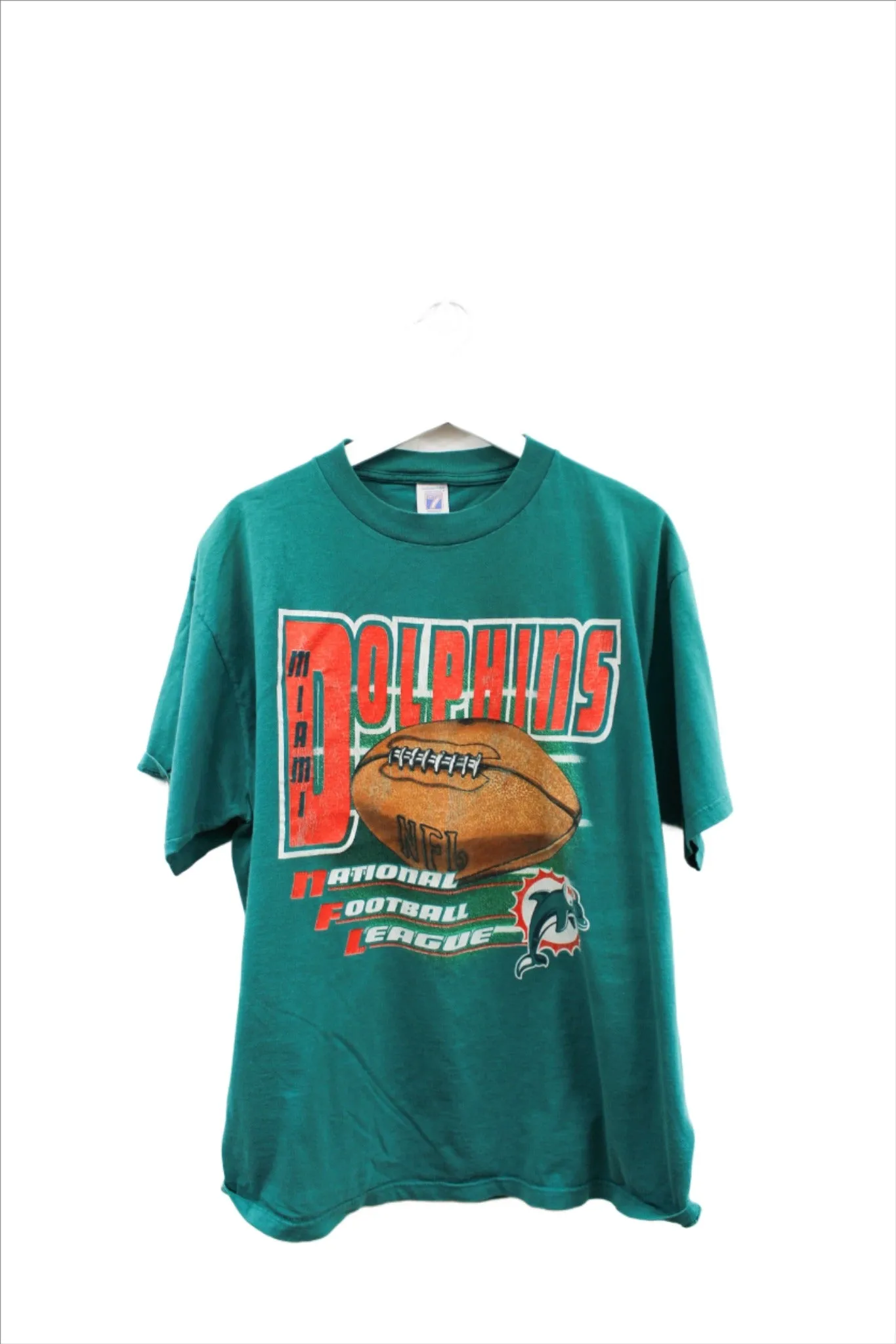 X - Vintage NFL Logo 7 Miami Dolphins Graphic Tee sold by HG Vintage
