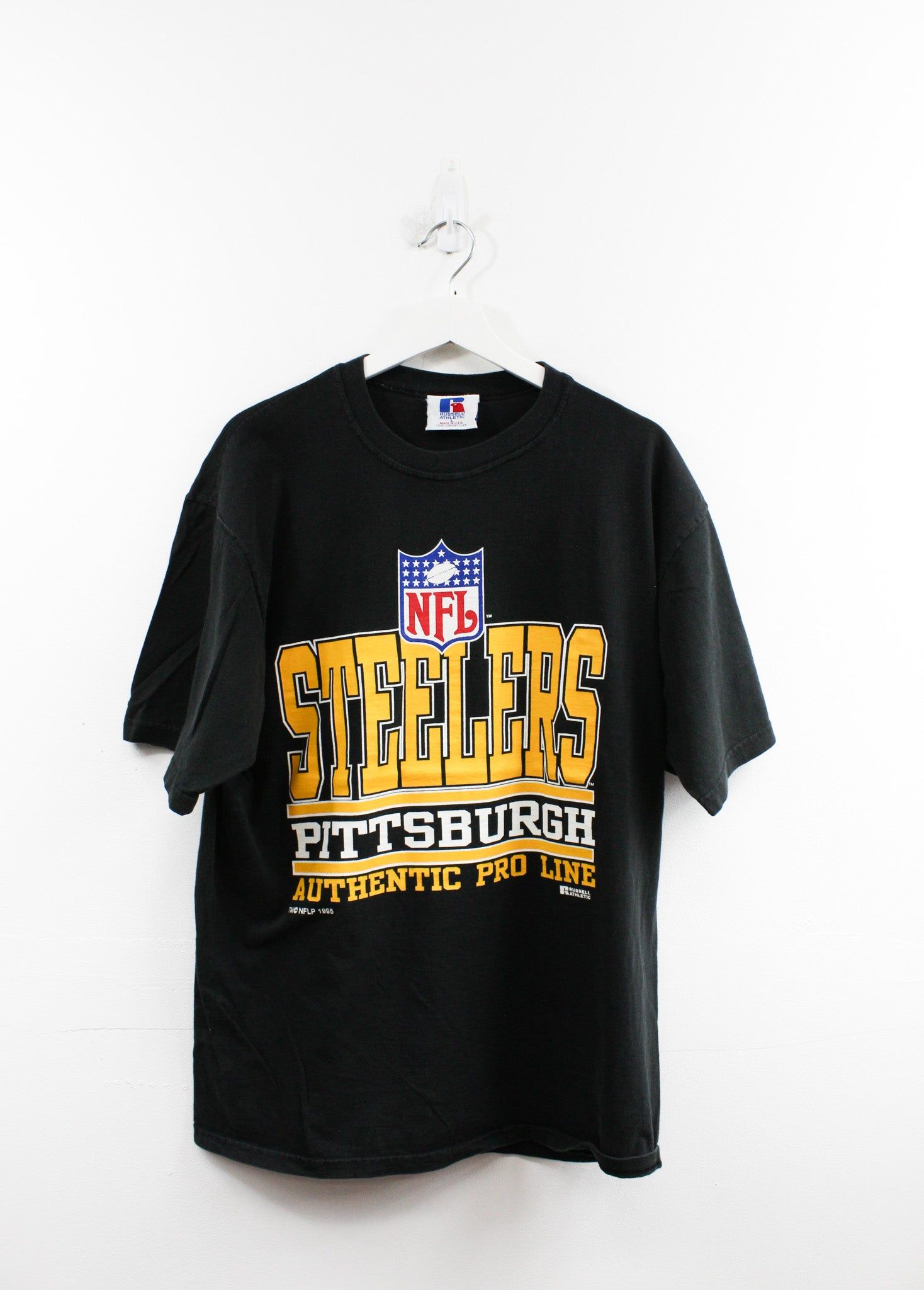 Vintage 95' Russell Athletic Made in USA NFL Pittsburgh Steelers Logo Tee sold by HG Vintage