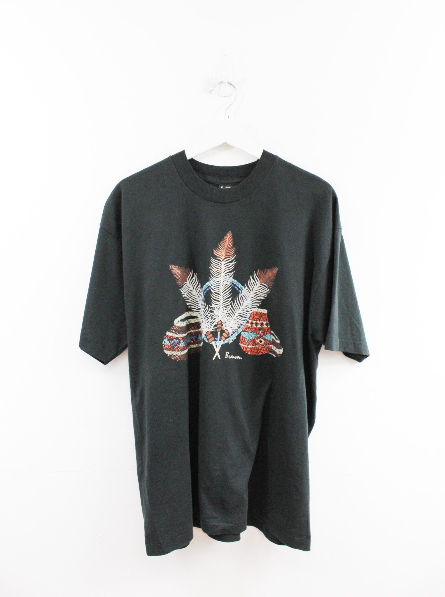 Feathers And Pots 93' Graphic Tee sold by HG Vintage