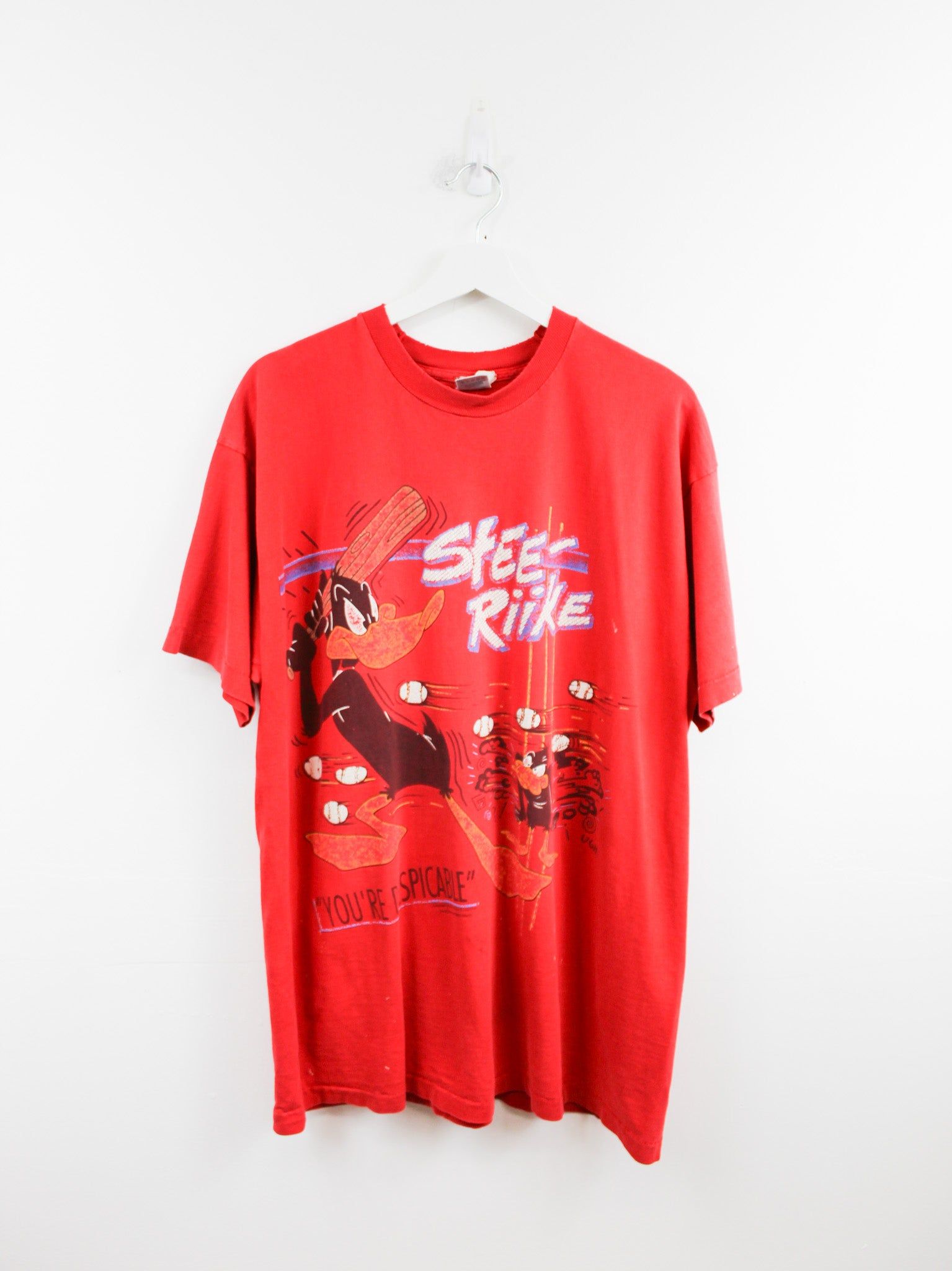 Daffy Duck 93' Strikeout Tee sold by HG Vintage