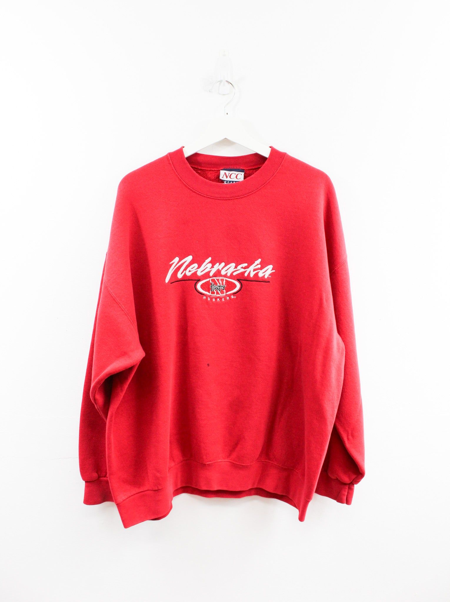 Vintage Nebraska Huskers Embroidered Logo Crewneck sold by HG Vintage