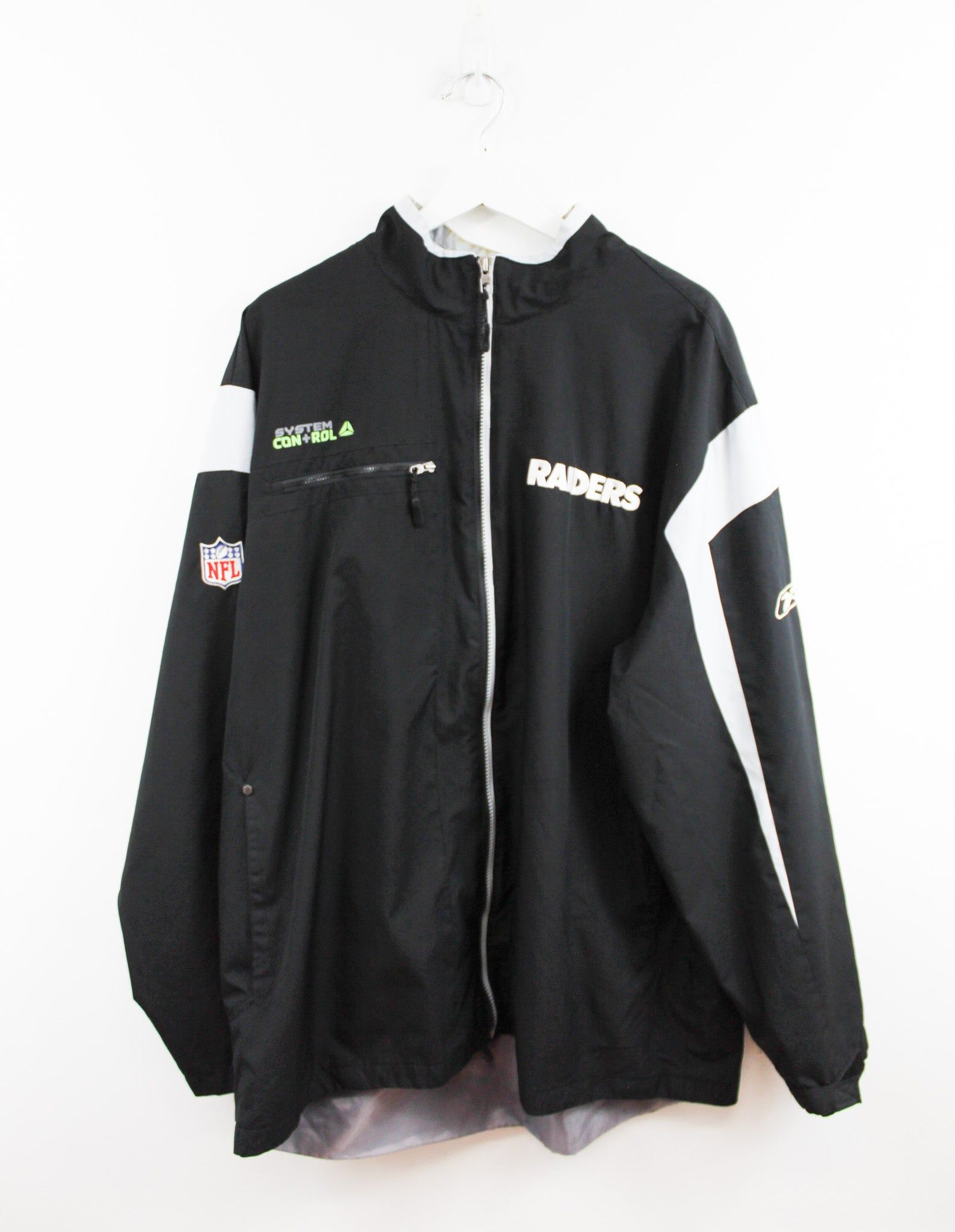 Vintage Reebok X NFL Raiders Windbreaker sold by HG Vintage
